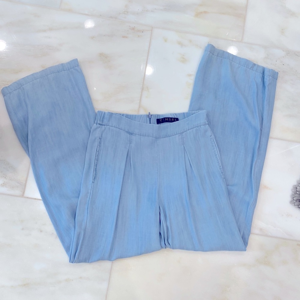 Jean like casual pant. Flared bottom. Loose fit